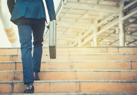 man walking up the stairs