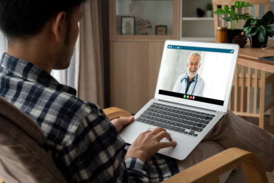 Doctor video call online by modish telemedicine software application for virtual meeting with patient